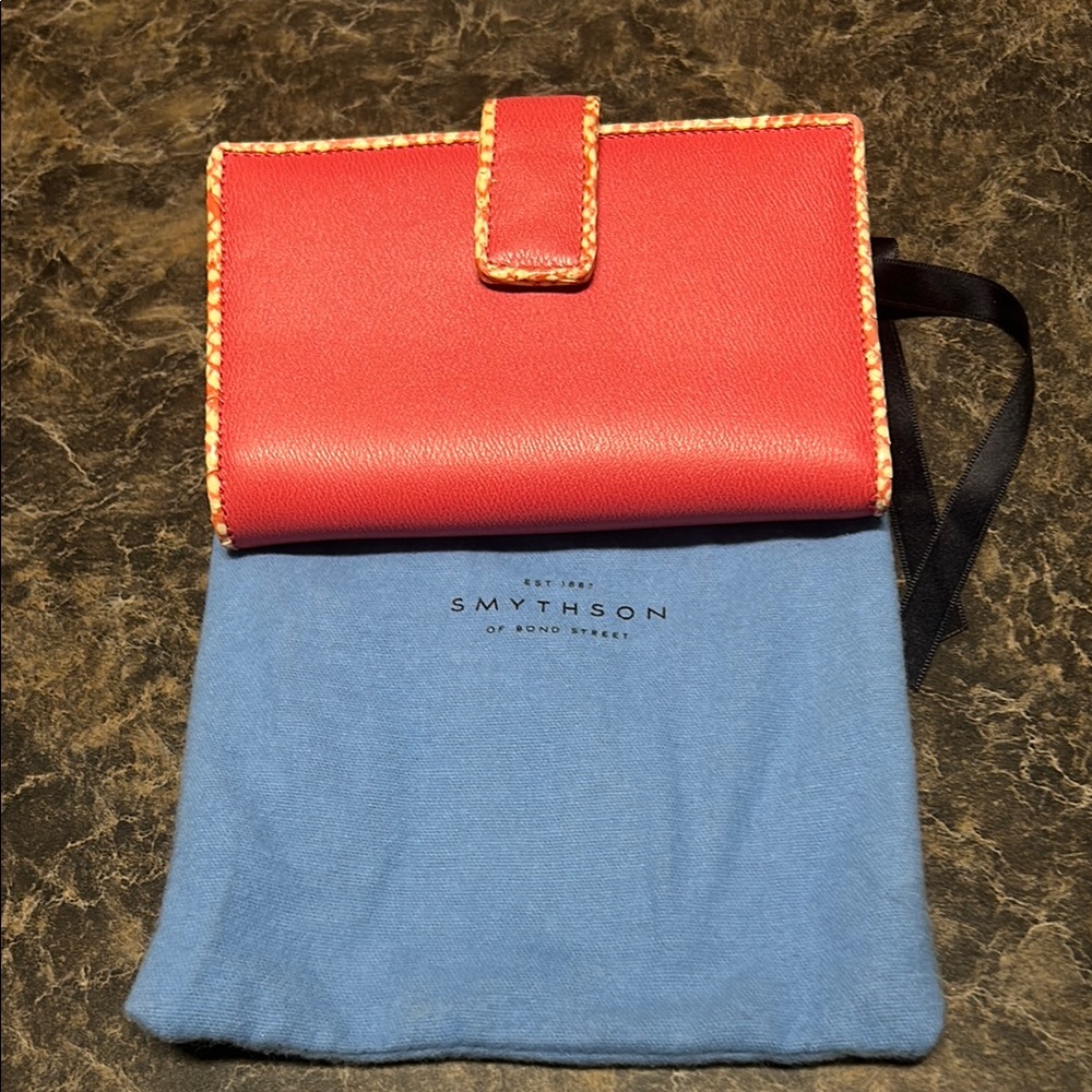 Smythson of Bond Street ladies bifold wallet in pink leather.